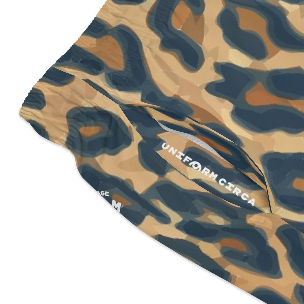 NAVY/SAND LEOPARD SWIM TRUNKS | Printed